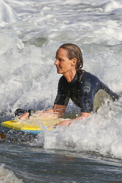 Helen Hunt in Wetsuit Bodyboarding at a Beach in Malibu 2020/06/13 2