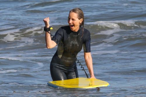 Helen Hunt in Wetsuit Bodyboarding at a Beach in Malibu 2020/06/13 4