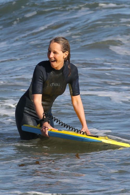 Helen Hunt in Wetsuit Bodyboarding at a Beach in Malibu 2020/06/13 5
