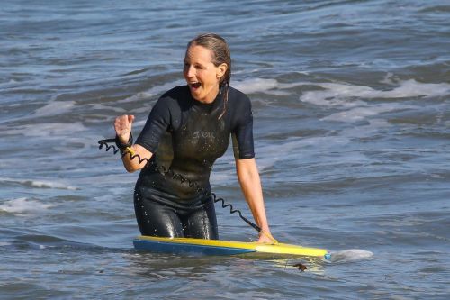 Helen Hunt in Wetsuit Bodyboarding at a Beach in Malibu 2020/06/13 10