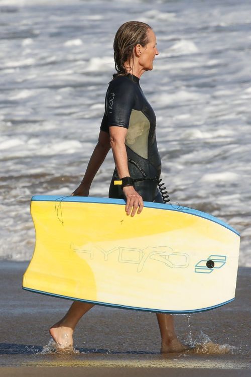 Helen Hunt in Wetsuit Bodyboarding at a Beach in Malibu 2020/06/13 12