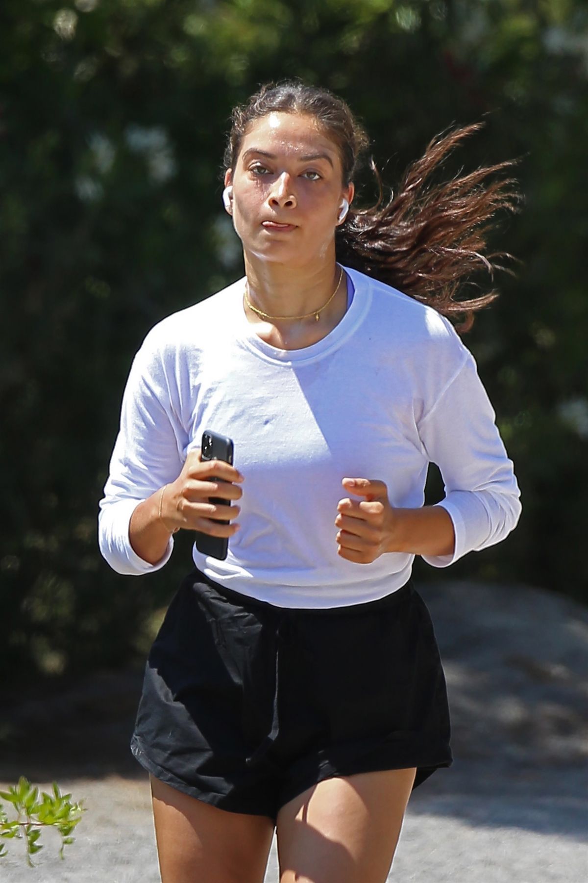 Shanina Shaik in White Full Sleeve Top and Black Shorts During Jogging 2020/06/02