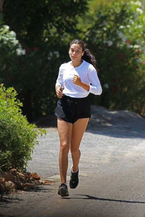 Shanina Shaik in White Full Sleeve Top and Black Shorts During Jogging 2020/06/02
