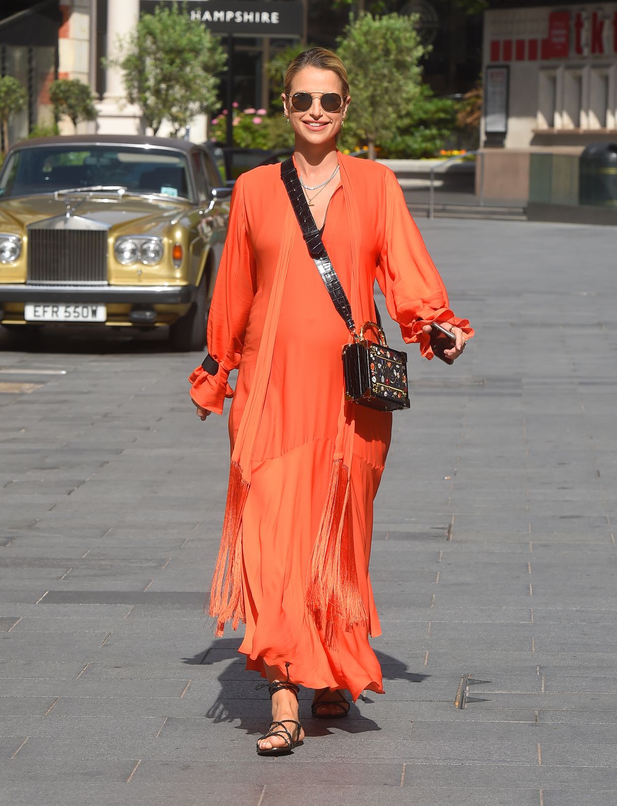 Vogue Williams in a Orange Dress Leaves Global Radio in London 2020/06/07