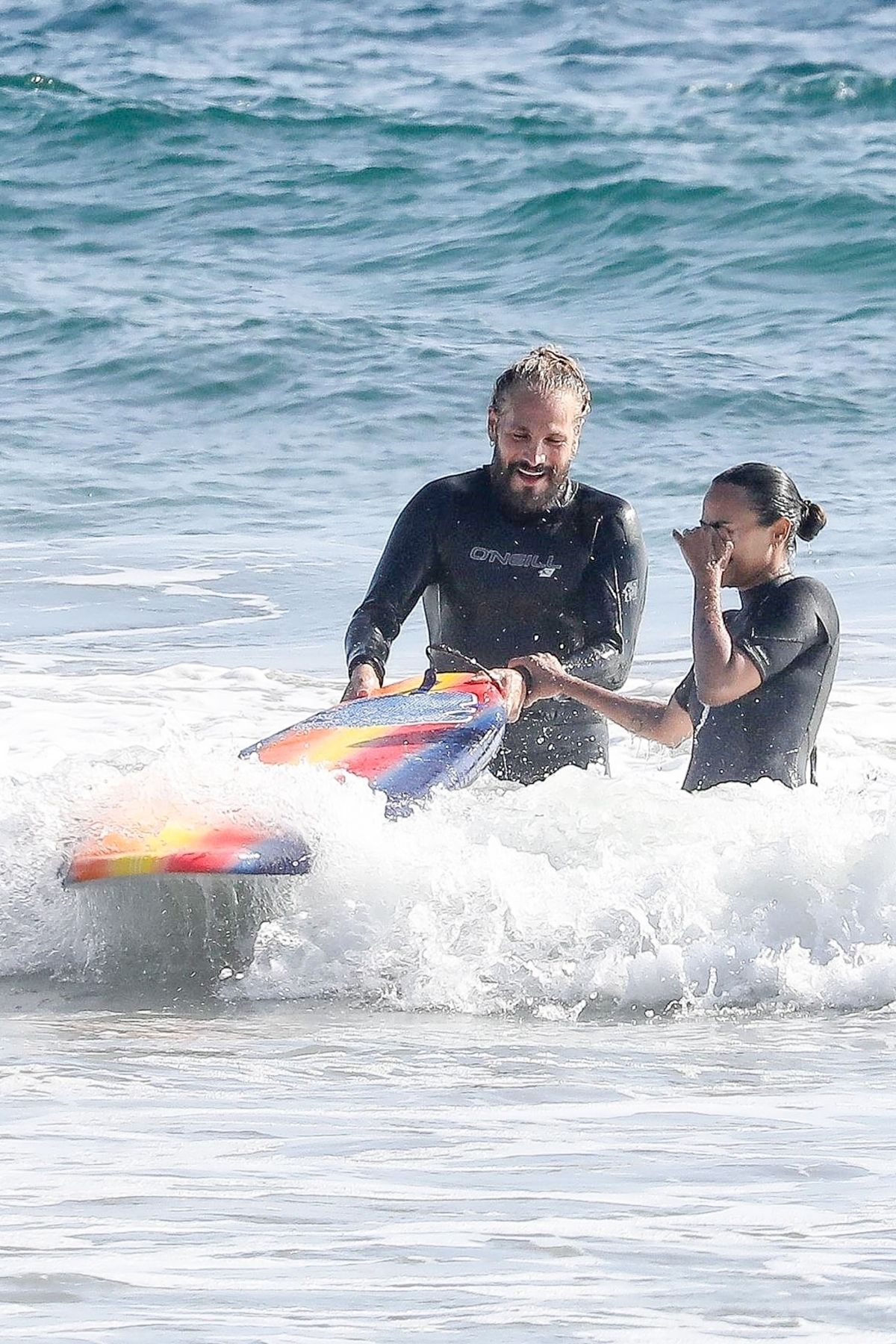 Zoe Saldana in Wetsuit at Surf Session in Malibu 2020/09/20