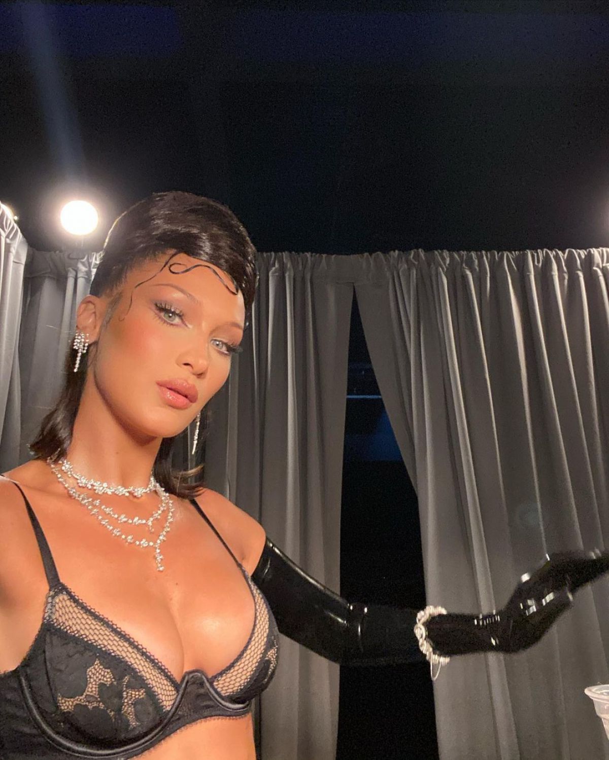 Bella Hadid in black bikini photoshoot 2020/10/25