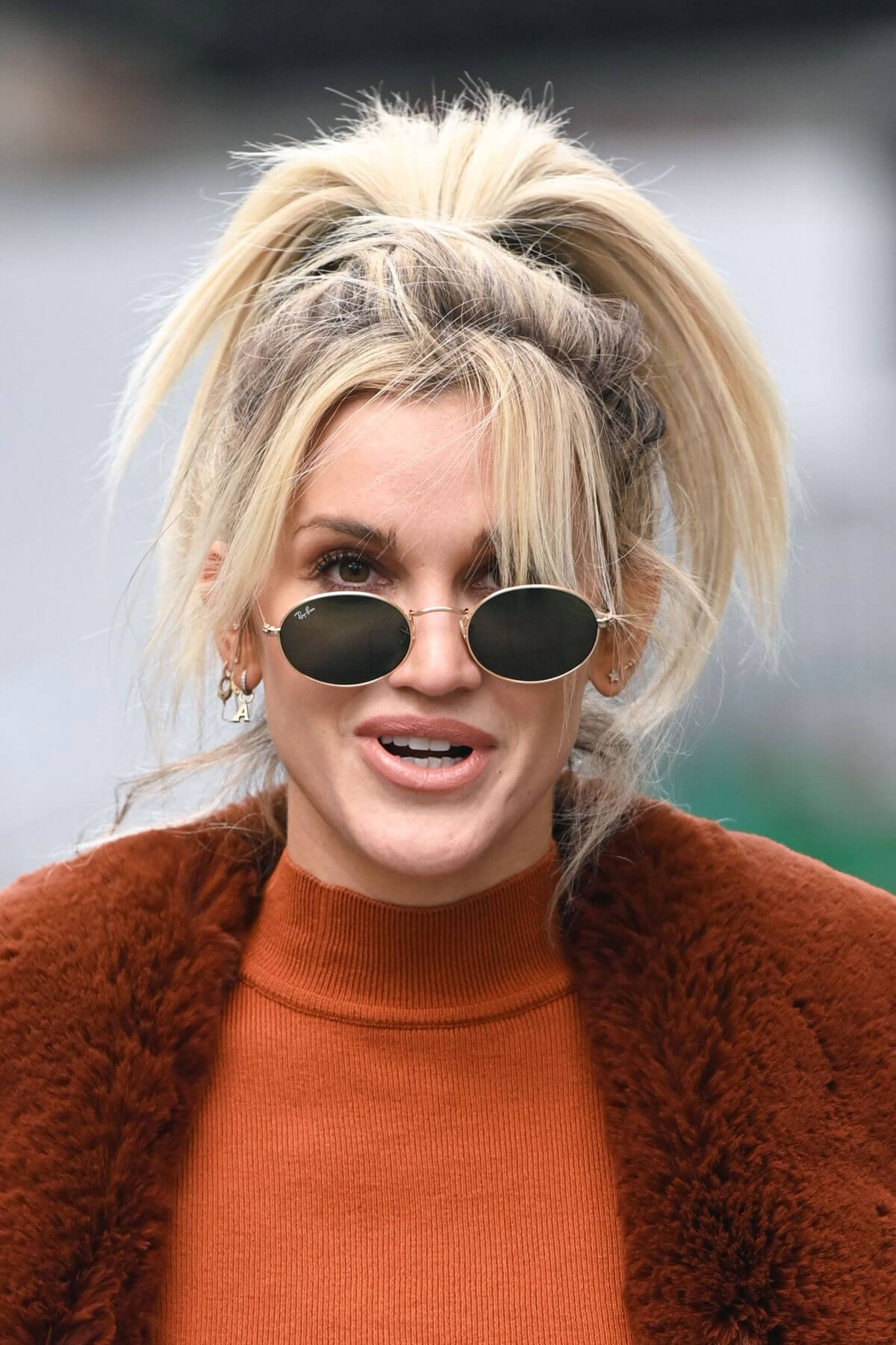 Ashley Roberts seen in Rust Color Dress Arrives at Heart Radio in London 11/24/2020