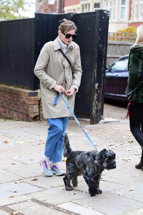 Emma Corrin in Long Coat Out with Her Dog in London 2020/10/18 10