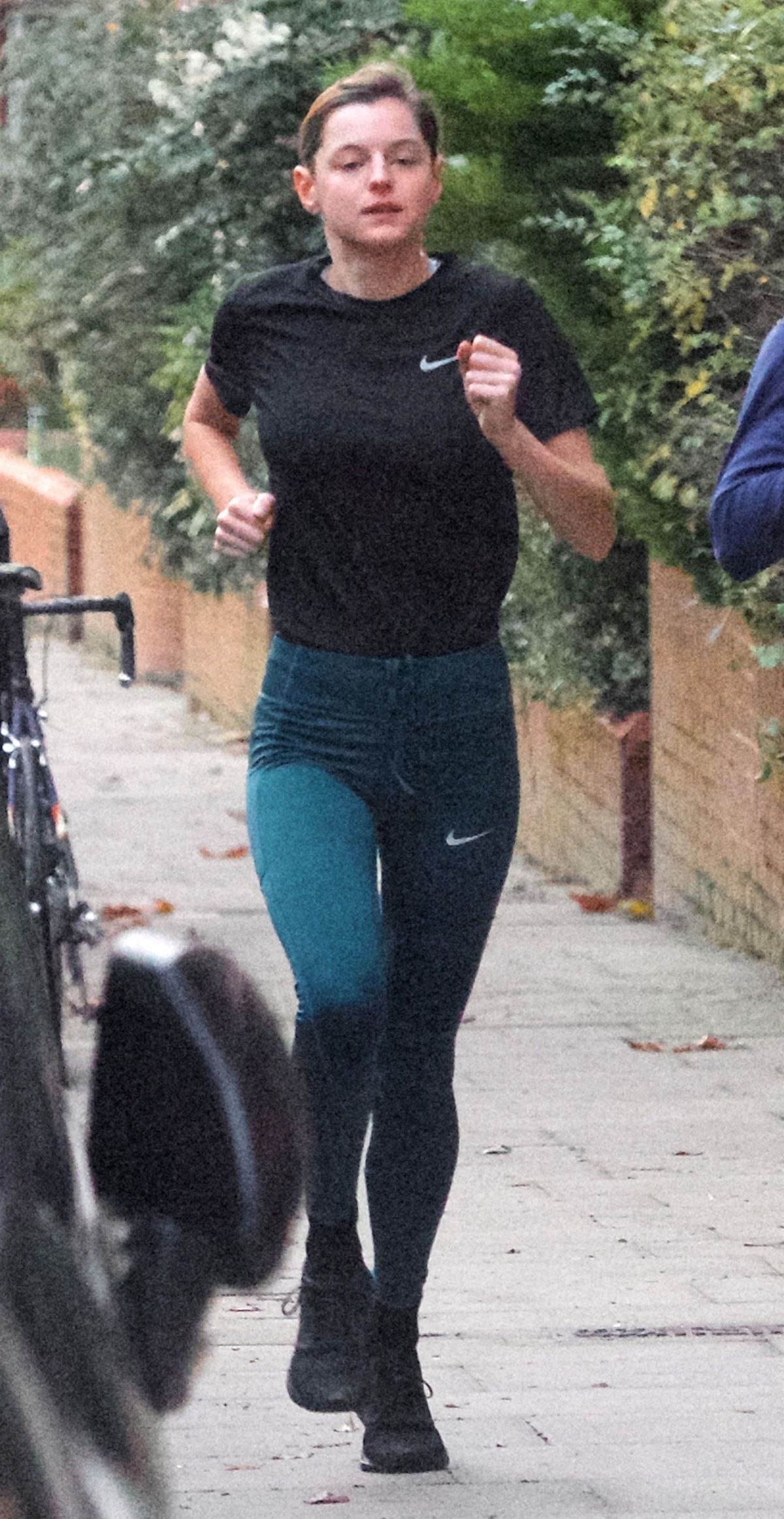 Emma Corrin Out Jogging with a Friend in London 2020/11/16