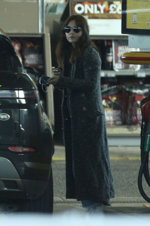 Jenna-Louise Coleman in Long Coat with Jeans at a Gas Station in London 2020/11/15 2