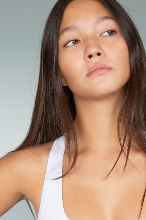 Lily Chee in Calvin Klein Sports Bra and Blue Jeans Photoshoot Portfolio, 2020 Issue