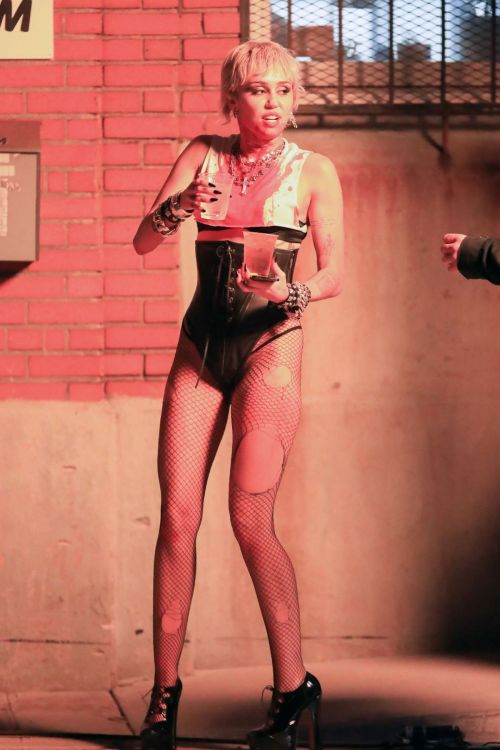 Miley Cyrus flashes her legs during Her Music Video Shoot in Brooklyn 10/01/2020