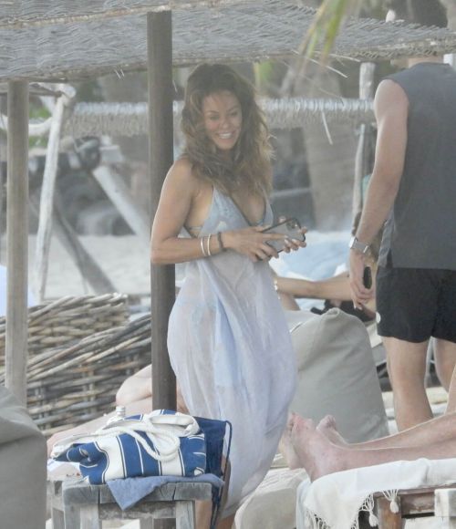 Brooke Burke in Bikini with her Boyfriend at a Beach in Tulum 11/28/2020 10