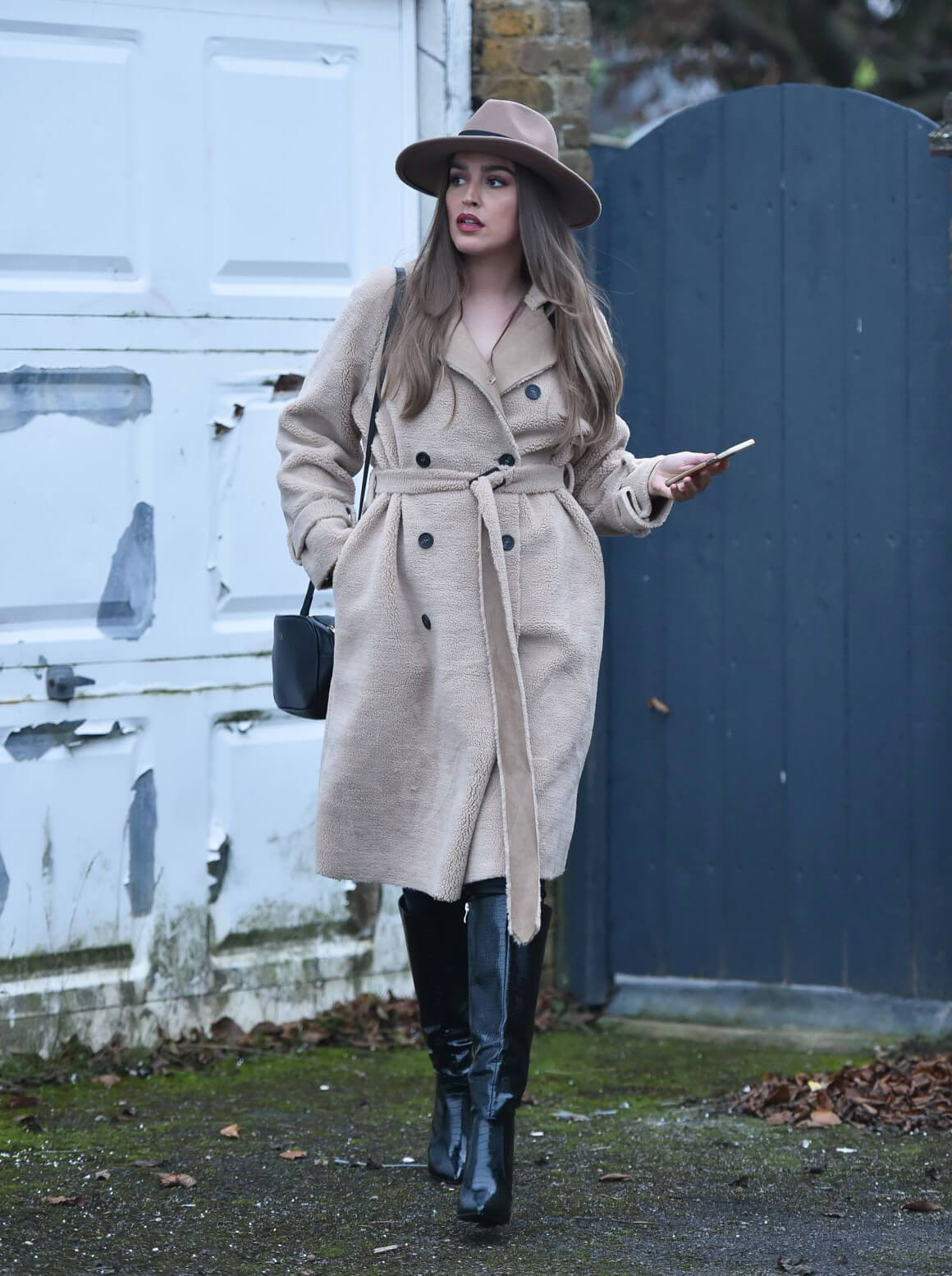 Chloe Ross in Long Coat with Boots After Leaves a Photoshoot in London 11/30/2020