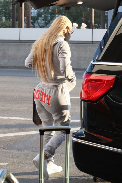 Iggy Azalea seen in BODY Grey Track paints at Los Angeles International Airport 11/25/2020 2