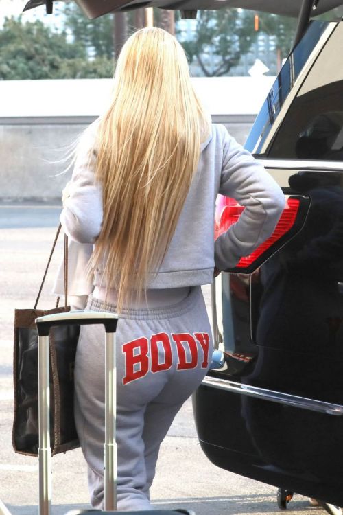 Iggy Azalea seen in BODY Grey Track paints at Los Angeles International Airport 11/25/2020 5