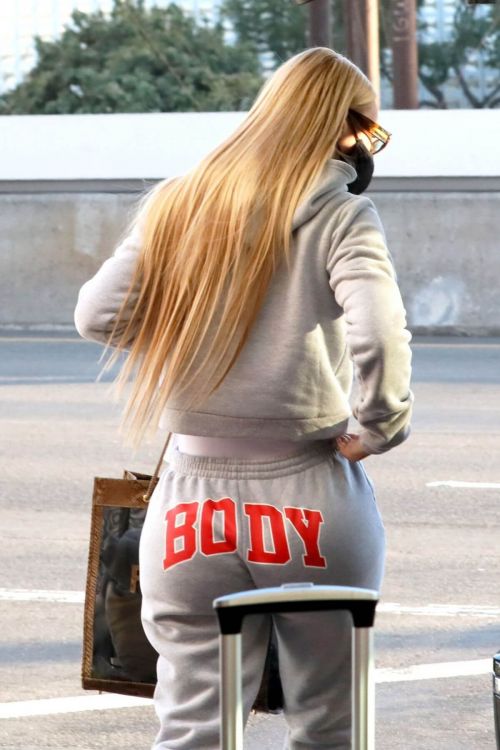 Iggy Azalea seen in BODY Grey Track paints at Los Angeles International Airport 11/25/2020 6