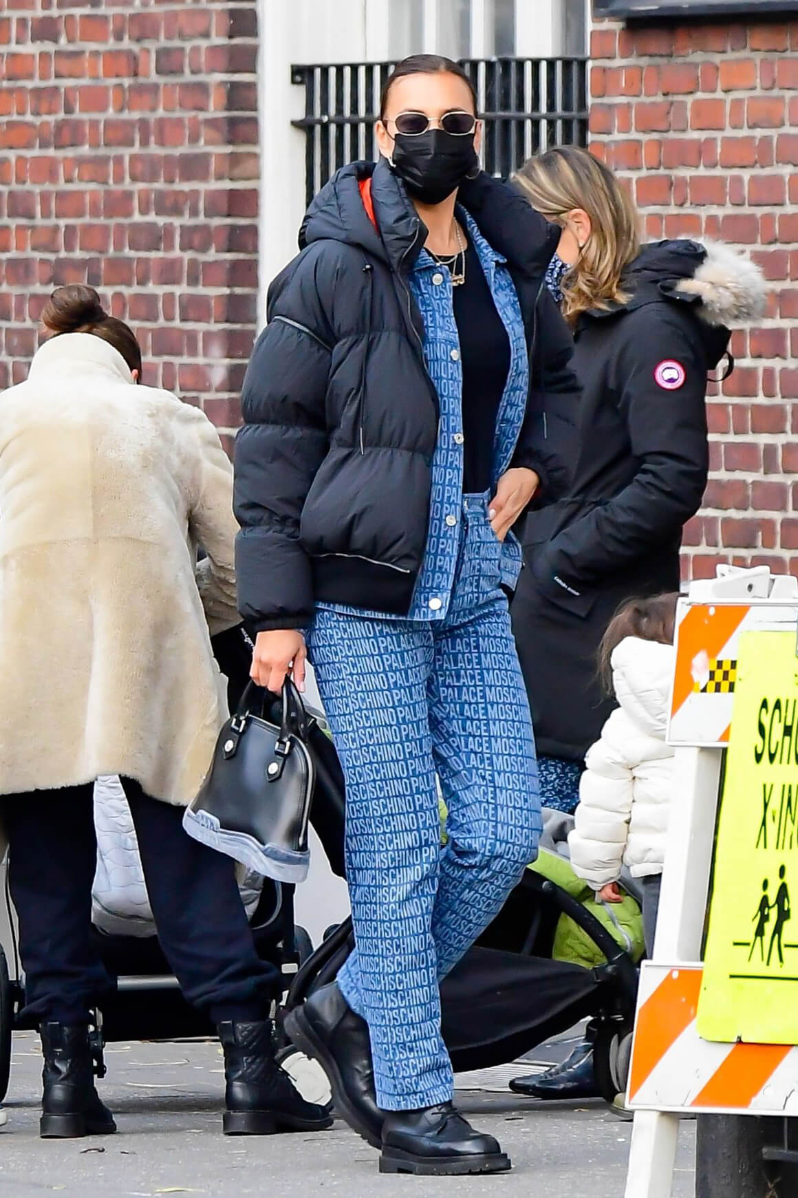 Irina Shayk seen in Black Puffer Jacket with Blue Outfit Out in New York 12/02/2020