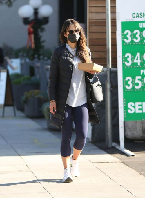 Jordana Brewster seen in Long Puffer Jacket at a Gas Station in Brentwood 12/05/2020 9