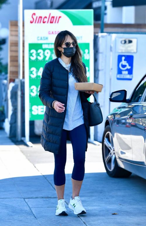 Jordana Brewster seen in Long Puffer Jacket at a Gas Station in Brentwood 12/05/2020 10