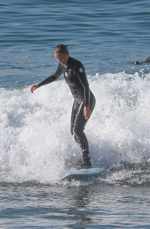 Lara Worthington in Wetsuit Surfing in Malibu 12/03/2020 5
