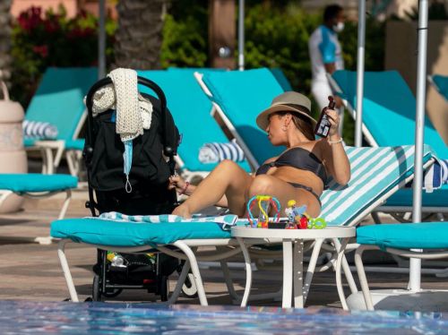 Lauryn Goodman flashes her cleavage in Bikini at a Pool in Dubai 11/26/2020 2