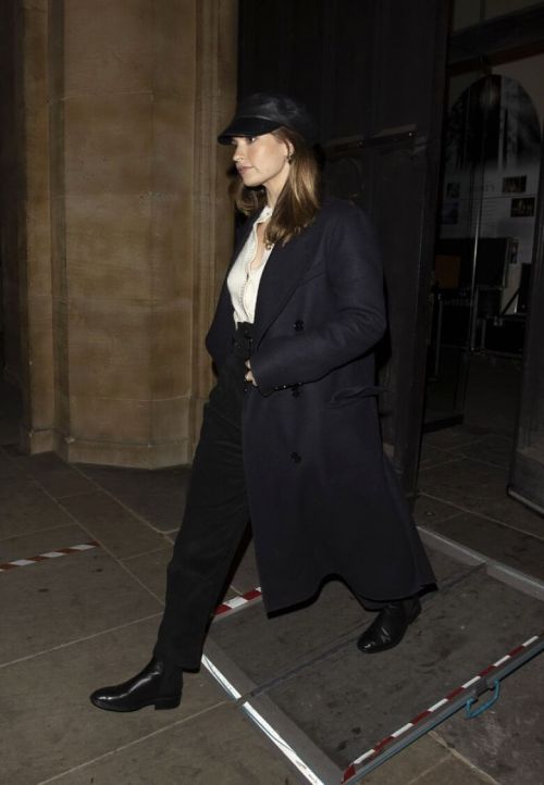 Lily James in a Black Long Coat Leaves St. Luke