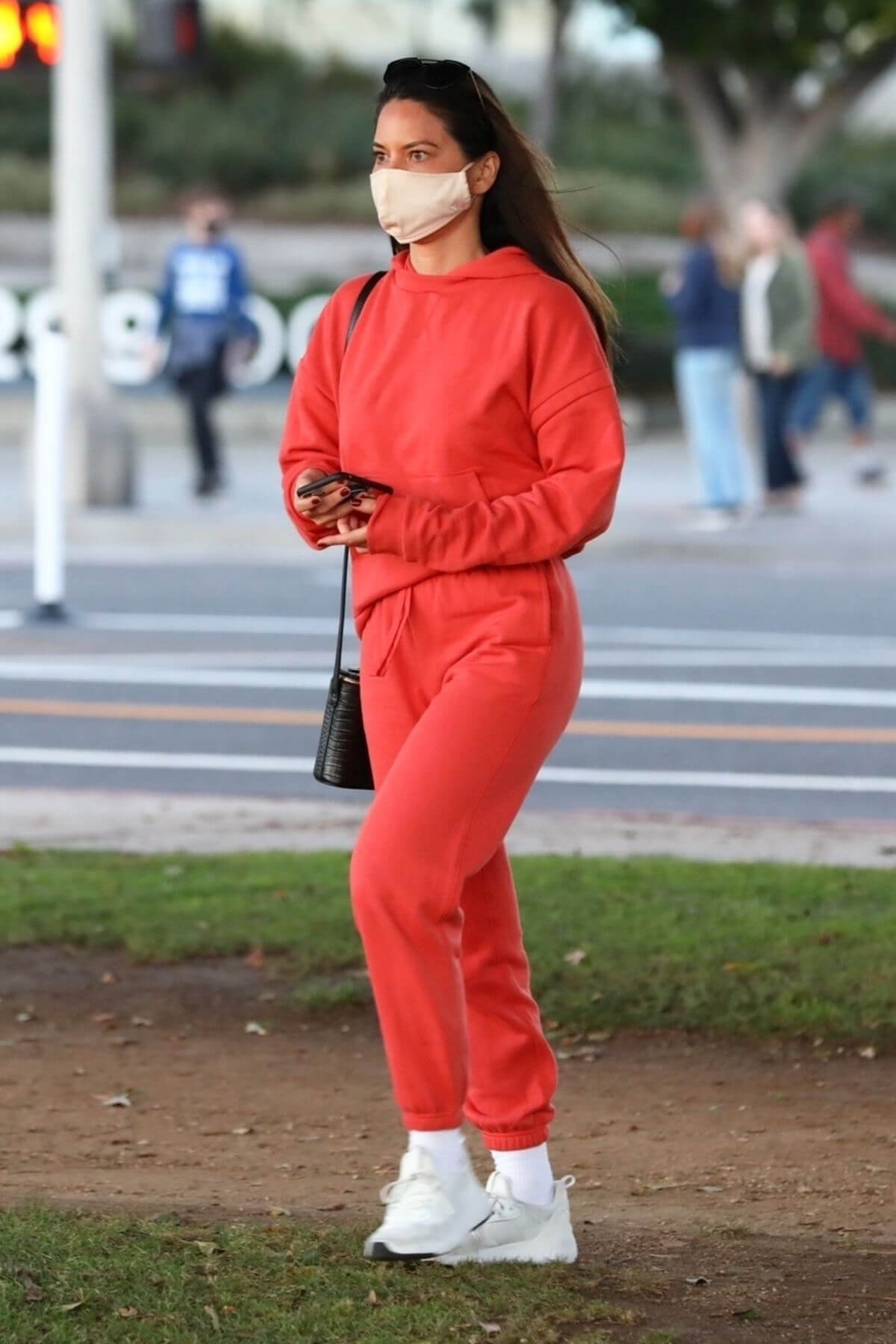 Olivia Munn seen in Red Sweatsuits Set Out and About in Santa Monica 11/24/2020