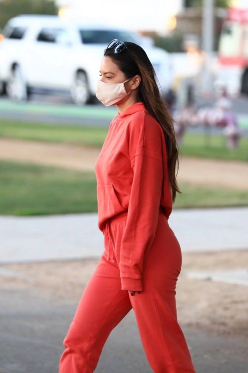 Olivia Munn seen in Red Sweatsuits Set Out and About in Santa Monica 11/24/2020