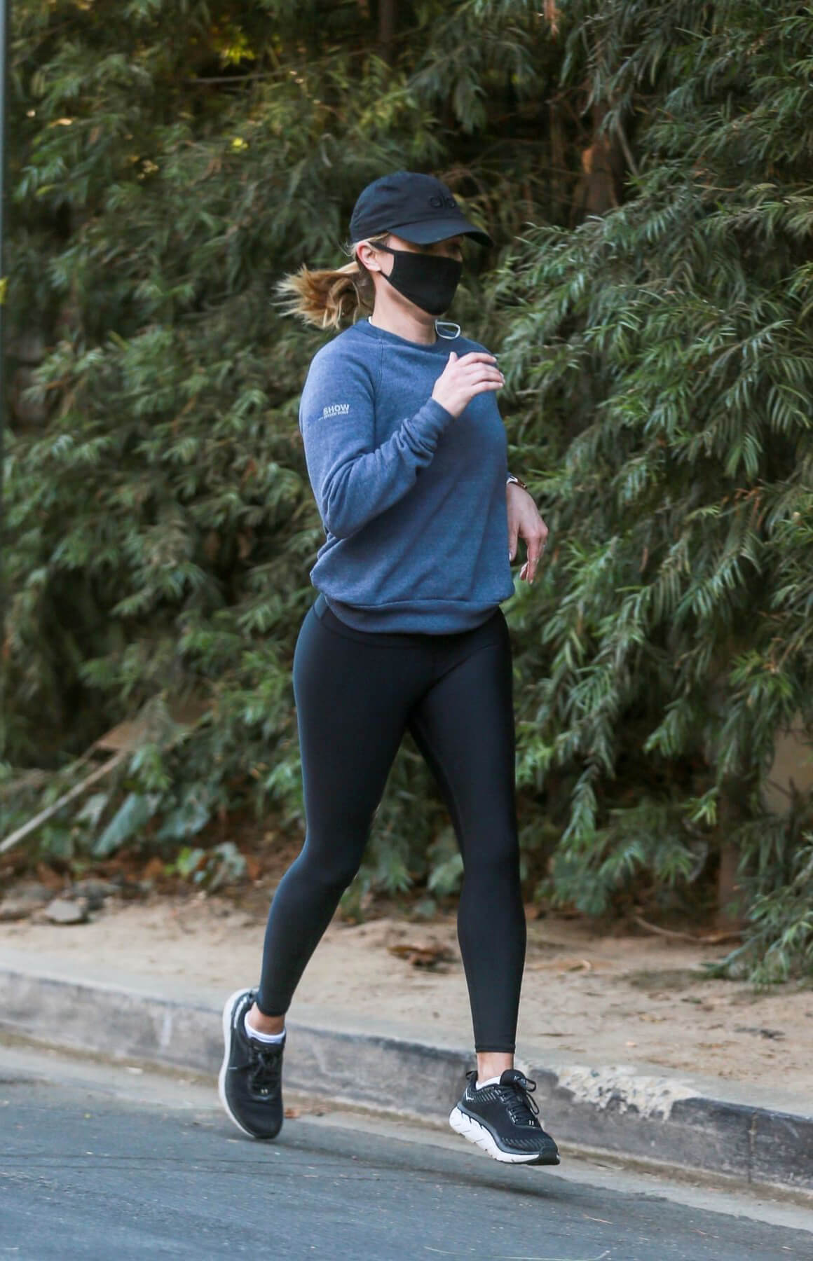 Reese Witherspoon in Tights Out Jogging in Brentwood 12/04/2020