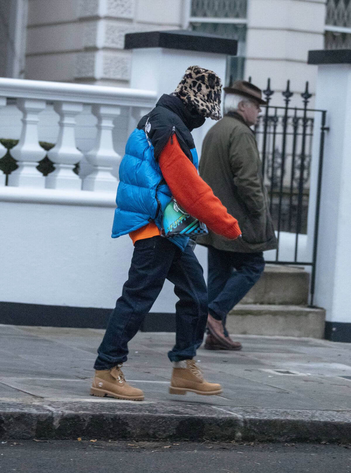 Rita Ora in Puffer Jacket with Brown Boots Out and About in London 11/25/2020 5