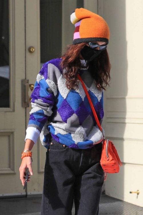 Bella Hadid Leaves Her Apartment in Orange Cap with Check Sweater 02/11/2021 7