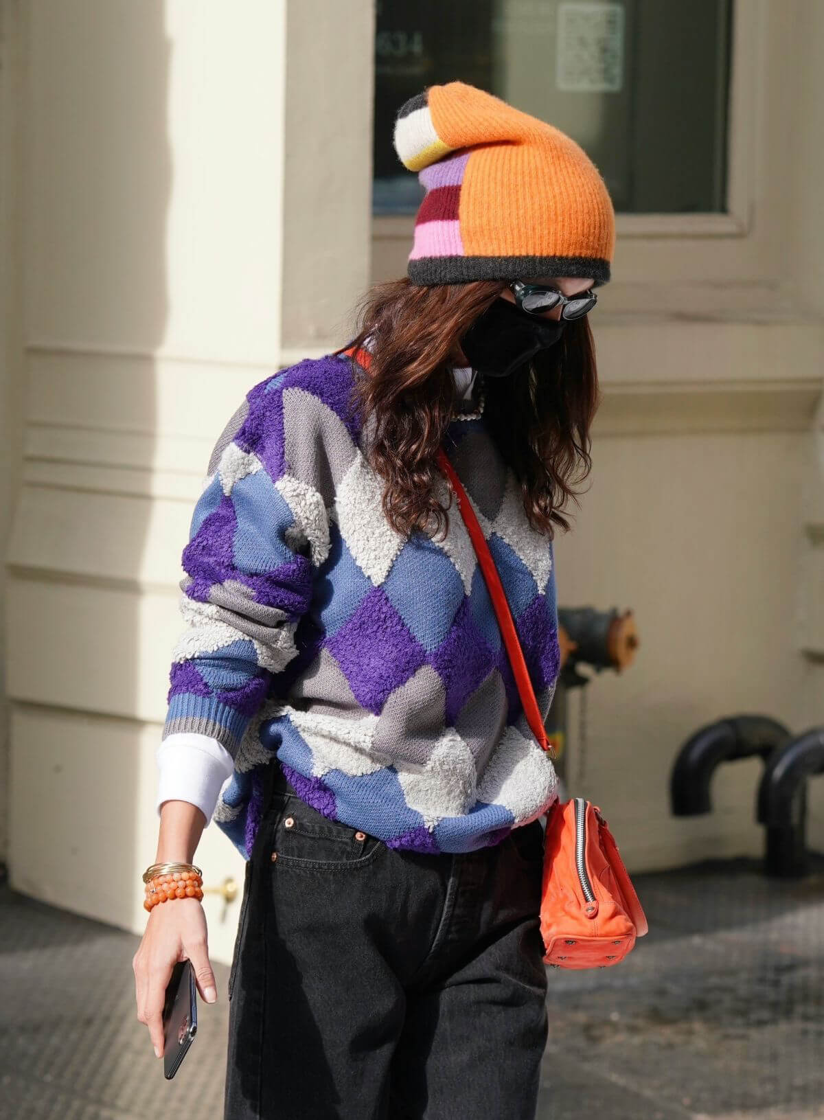 Bella Hadid Leaves Her Apartment in Orange Cap with Check Sweater 02/11/2021 2