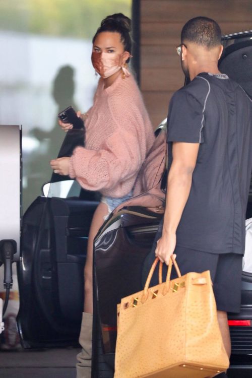 Chrissy Teigen in a Pink Top and Denim Shorts Out in Los Angeles 02/11//2021 5