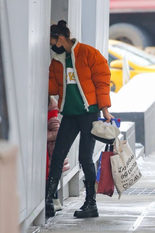 Irina Shayk in Orange Puffer Jacket Out Shopping in New York 02/11/2021 1