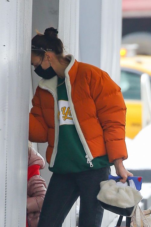 Irina Shayk in Orange Puffer Jacket Out Shopping in New York 02/11/2021 3