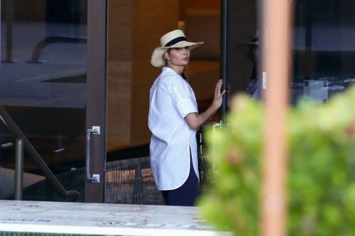 Ivanka Trump in a White Shirt at a Pool in Miami 02/11/2021 1