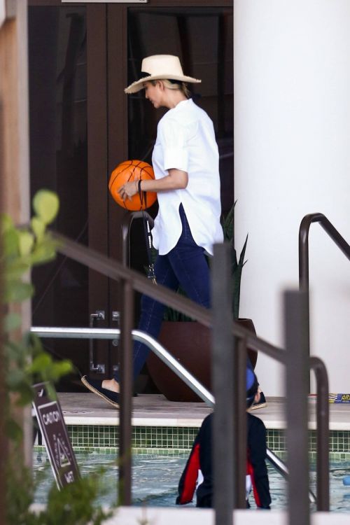 Ivanka Trump in a White Shirt at a Pool in Miami 02/11/2021 2
