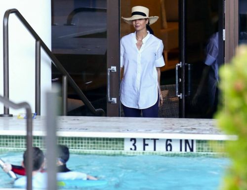 Ivanka Trump in a White Shirt at a Pool in Miami 02/11/2021 2