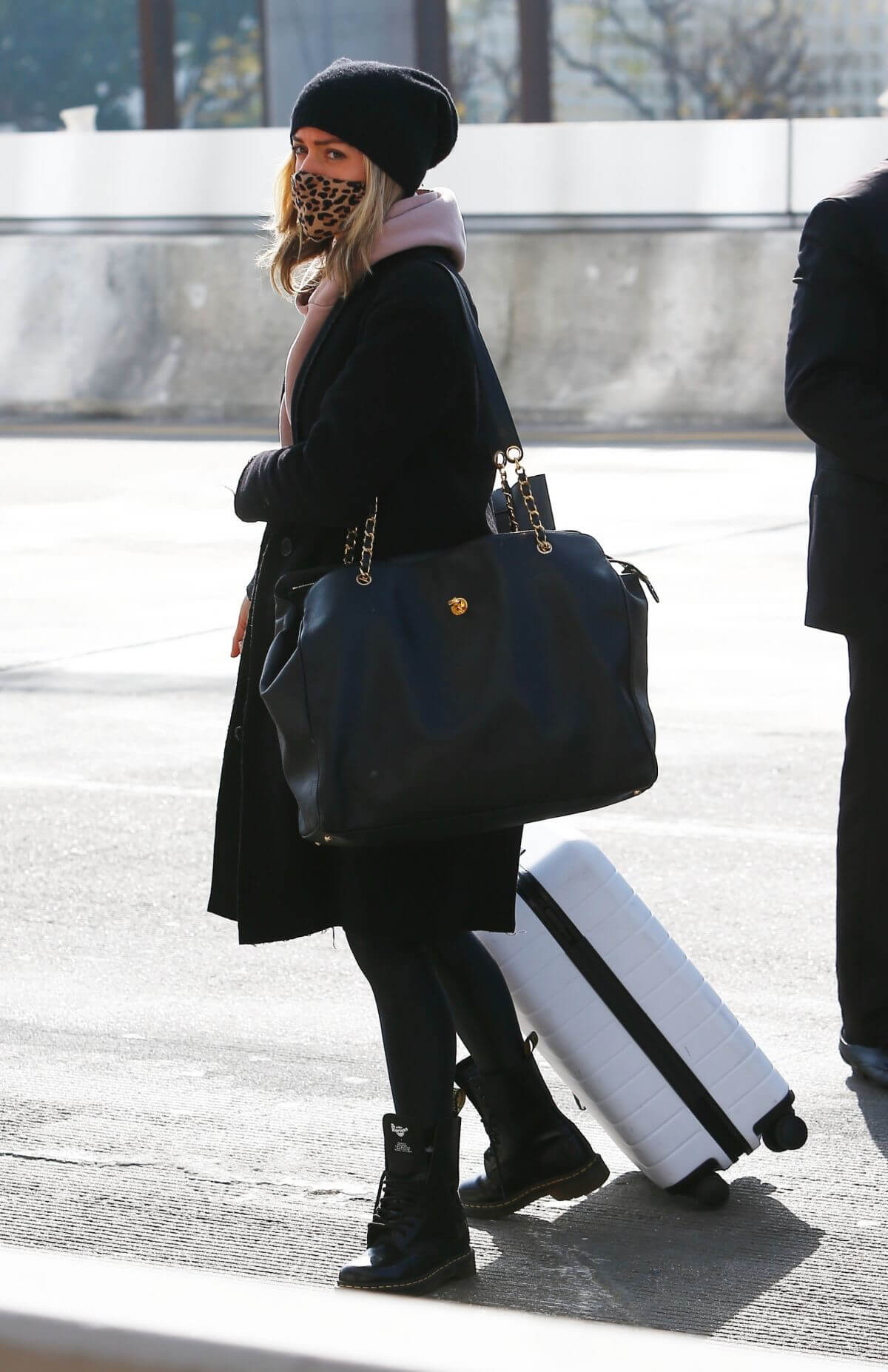 Kristin Cavallari in a Leopard Print Face Mask at LAX Airport in Los Angeles 02/11/2021