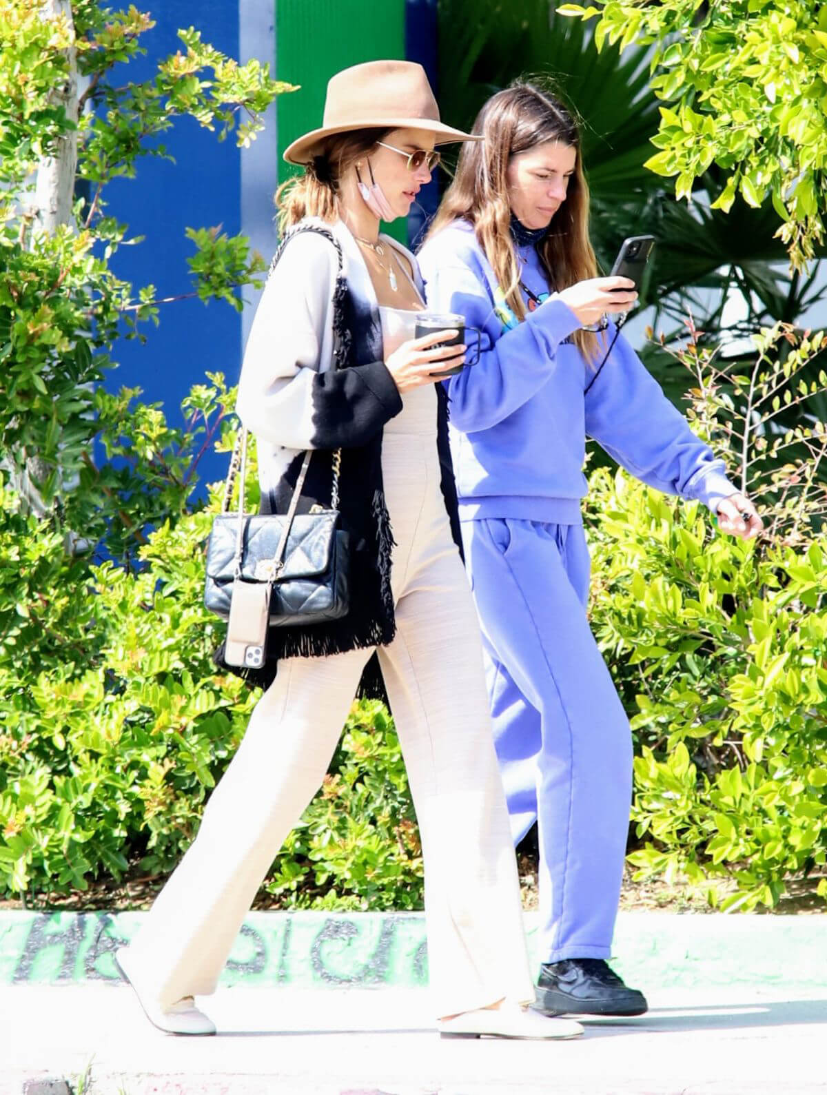 Alessandra Ambrosio wore a Chic Jumpsuit and Beige Fedora Hat as She is Out for Coffee with her Pal in Malibu 03/14/2021