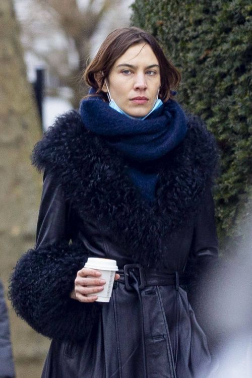 Alexa Chung in Leather Coat with her boyfriend Orson Fry Out in London 03/13/2021