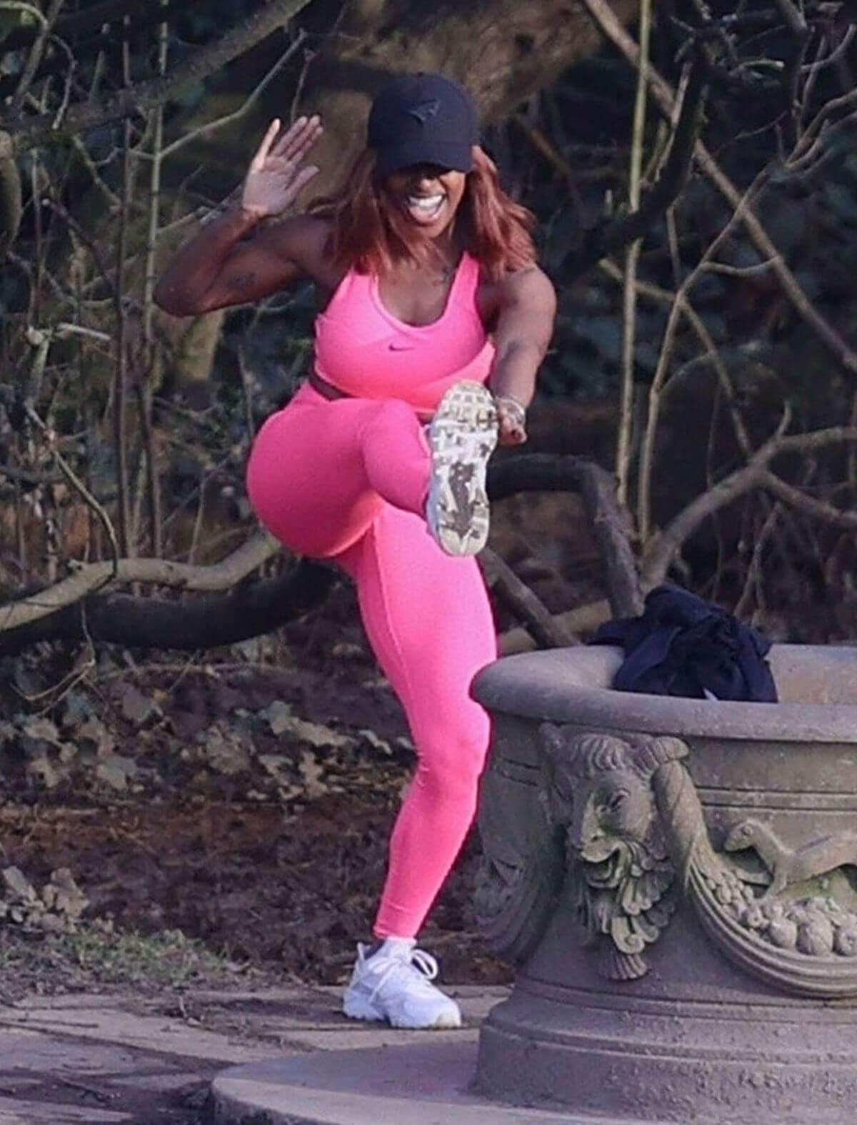 Alexandra Burke Complete Her Sports Look in Bold Pink Sportswear as She Workout at a Park in London 03/10/2021
