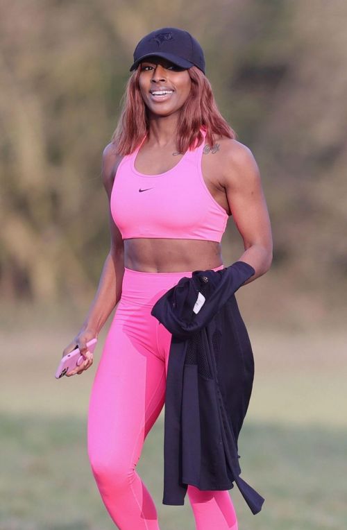 Alexandra Burke Complete Her Sports Look in Bold Pink Sportswear as She Workout at a Park in London 03/10/2021 1