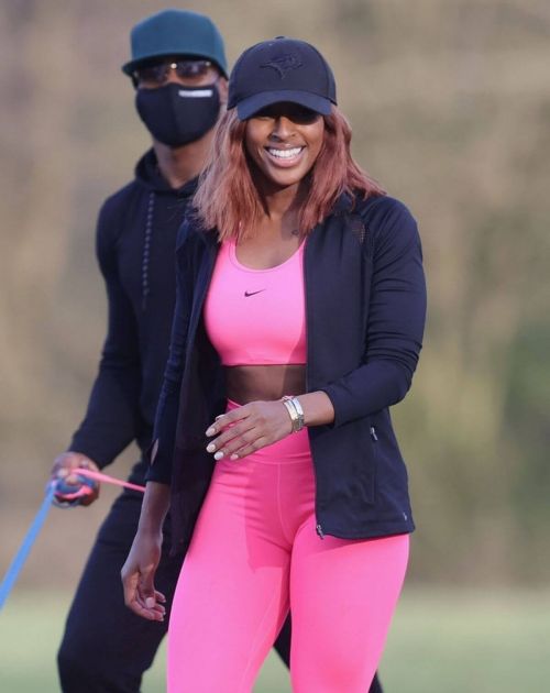 Alexandra Burke Complete Her Sports Look in Bold Pink Sportswear as She Workout at a Park in London 03/10/2021 7