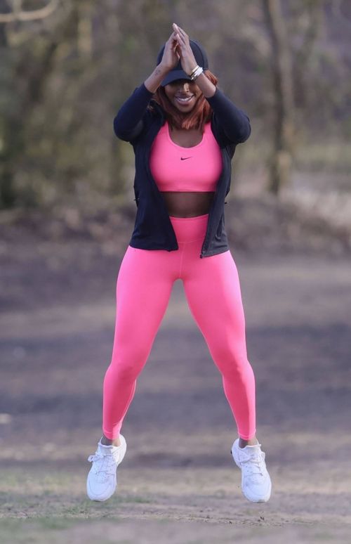 Alexandra Burke Complete Her Sports Look in Bold Pink Sportswear as She Workout at a Park in London 03/10/2021 9