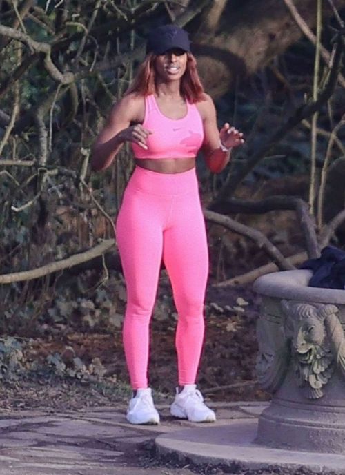 Alexandra Burke Complete Her Sports Look in Bold Pink Sportswear as She Workout at a Park in London 03/10/2021 3
