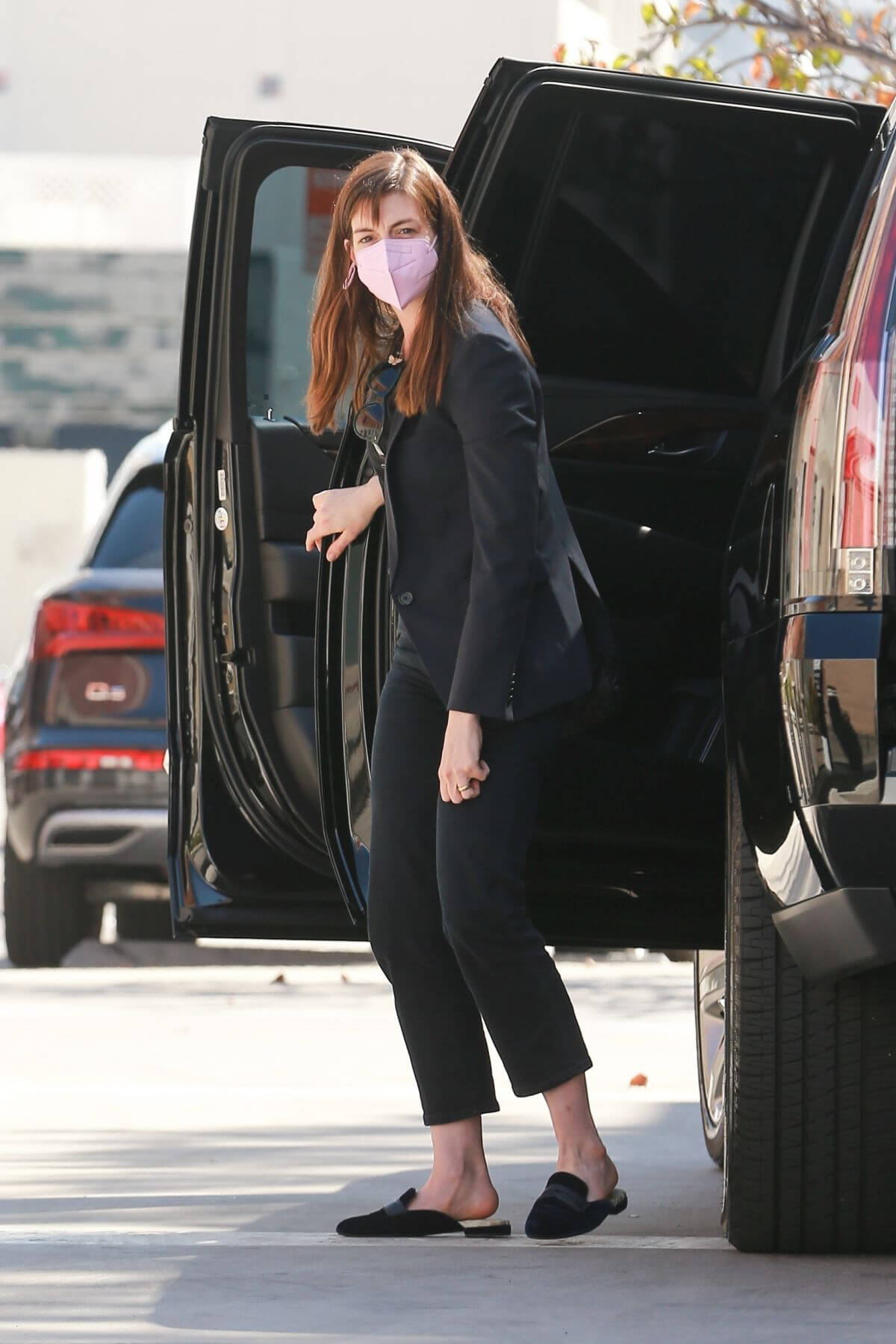 Anne Hathaway Steps Out from Car and Arrives at a Meeting in Los Angeles 02/24/2021