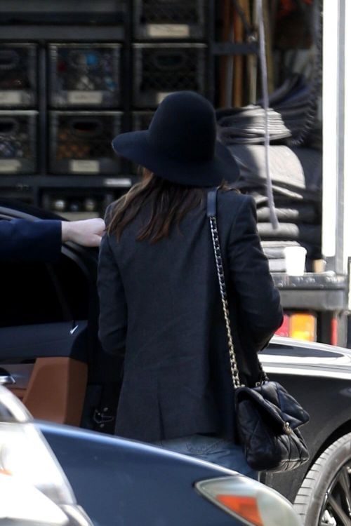 Anne Hathaway wears Black Blazer and Matching Fedora with Blue Denim as She Arrives at Milk Studios in Hollywood 03/12/2021