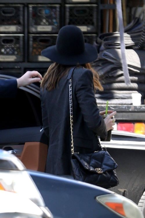 Anne Hathaway wears Black Blazer and Matching Fedora with Blue Denim as She Arrives at Milk Studios in Hollywood 03/12/2021 2